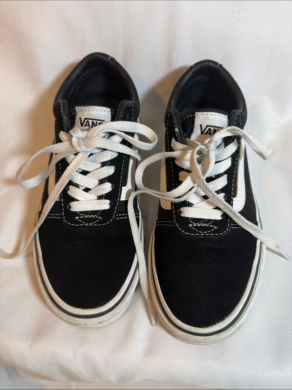 Vans women’s Black and White Low-Top Skate Sneakers